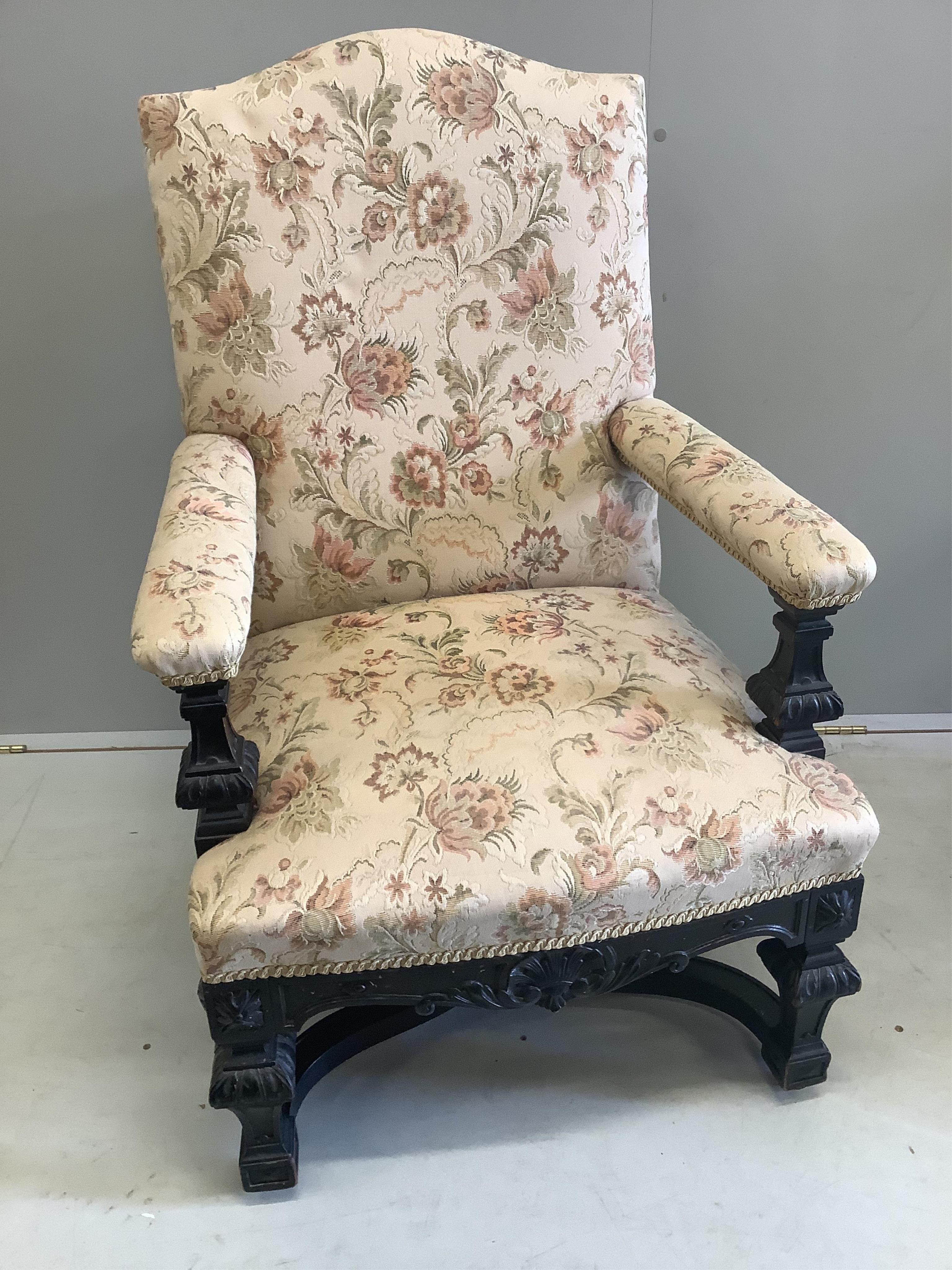 A pair of Louis XIV style ebonised upholstered armchairs, width 65cm, depth 56cm, height 103cm